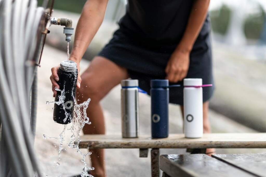 Amazing Discovery: Drinking Water After Meals Increases Blood Sugar By 33% a person pouring water into a can