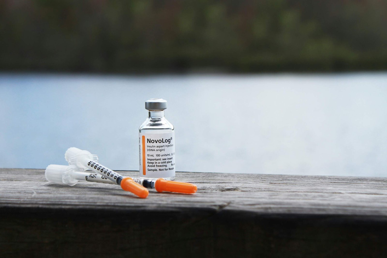 Anti-Diabetic Drugs: A Guide To Blood Sugar Management orange and white plastic bottle on brown wooden table
